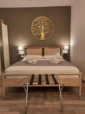 Letto o letti in una camera di GELSO HOME