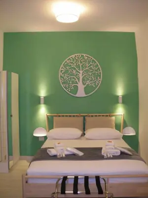 Letto o letti in una camera di GELSO HOME