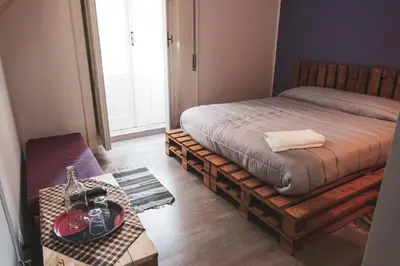Letto o letti in una camera di B&B Napoli Ruck&Maul