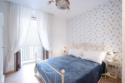 Letto o letti in una camera di La Casa di Assunta Naples Historical Centre