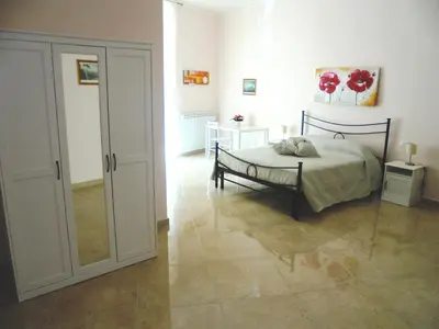 Letto o letti in una camera di Domusrealstella