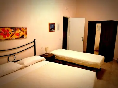 Letto o letti in una camera di Domusrealstella