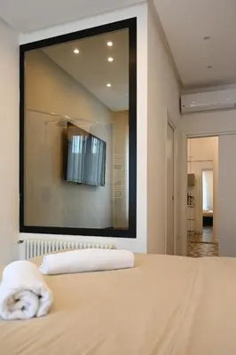 Letto o letti in una camera di QHouse