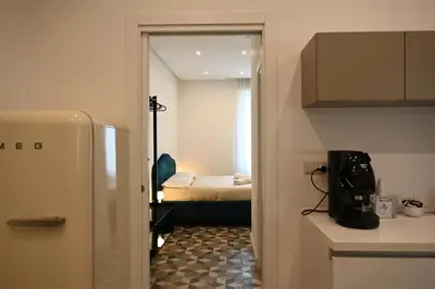 Letto o letti in una camera di QHouse
