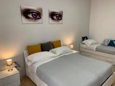 Letto o letti in una camera di la terrazza sul porto