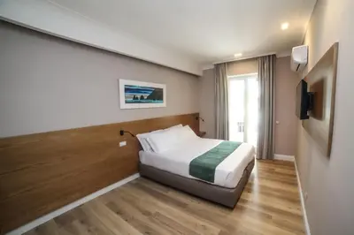 Letto o letti in una camera di Toledo Relais Exclusive Rooms