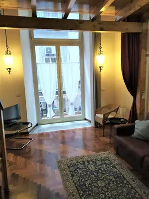 Area soggiorno di Il Castello Apartment