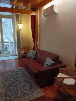 Area soggiorno di Il Castello Apartment