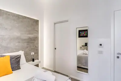 Letto o letti in una camera di Gallery Suite Naples