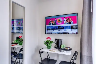 TV o dispositivi per l'intrattenimento presso Gallery Suite Naples