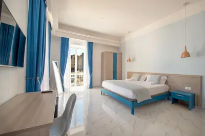 Letto o letti in una camera di MAIN - Municipio