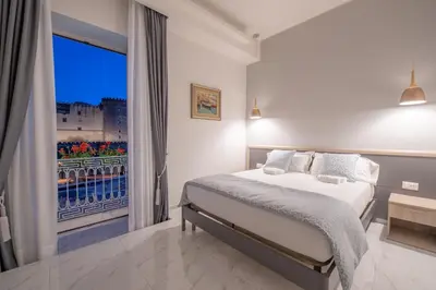 Letto o letti in una camera di MAIN - Municipio