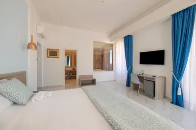 Letto o letti in una camera di MAIN - Municipio
