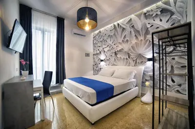 Letto o letti in una camera di Le Corti del Re