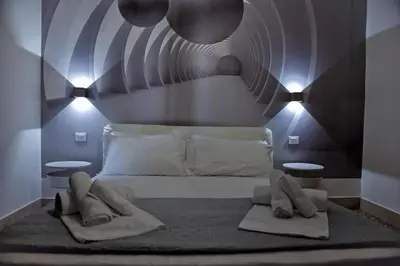 Letto o letti in una camera di Le Corti del Re