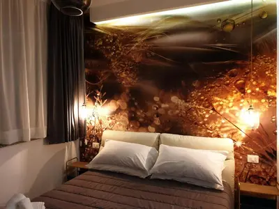 Letto o letti in una camera di Le Corti del Re