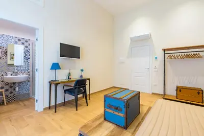 TV o dispositivi per l'intrattenimento presso La Gatta Cenerentola Rooms