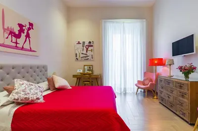 Letto o letti in una camera di La Gatta Cenerentola Rooms