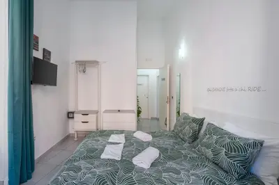 Letto o letti in una camera di Nina Suites