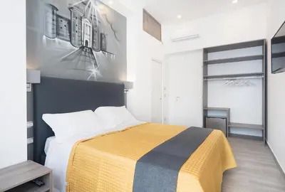 Letto o letti in una camera di B&B Toledo one