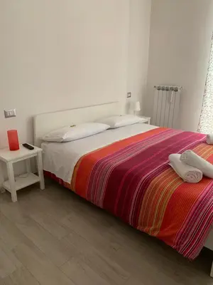 Letto o letti in una camera di La porta di Carmy