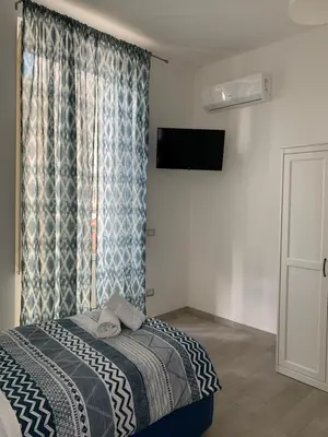 Letto o letti in una camera di La porta di Carmy