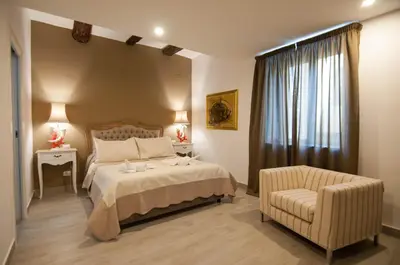 Letto o letti in una camera di Relais Bijoux Napoli