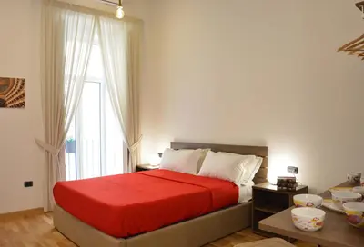 Letto o letti in una camera di Domus Studio 25 bed & breakfast