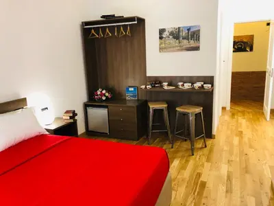 Letto o letti in una camera di Domus Studio 25 bed & breakfast