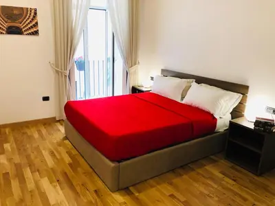 Letto o letti in una camera di Domus Studio 25 bed & breakfast