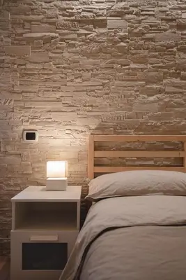Letto o letti in una camera di Casa Lena B&B