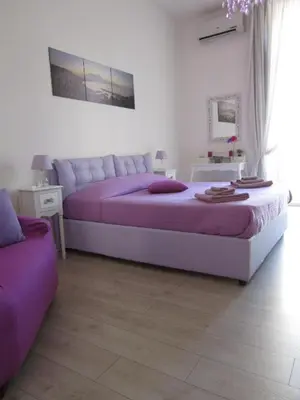Letto o letti in una camera di MareLuna B&B