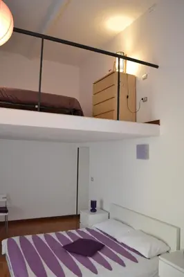 Letto o letti in una camera di MareLuna B&B