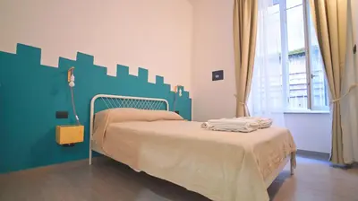 Letto o letti in una camera di Neapolitan Flat B&B