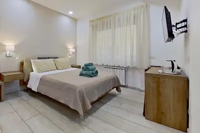 Letto o letti in una camera di Museo19