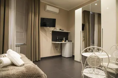TV o dispositivi per l'intrattenimento presso Residence Black & White