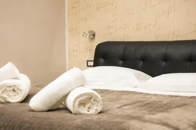 Letto o letti in una camera di Residence Black & White