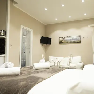 Letto o letti in una camera di Residence Black & White