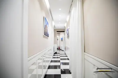 TV o dispositivi per l'intrattenimento presso Residence Black & White