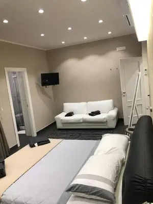 Letto o letti in una camera di Residence Black & White