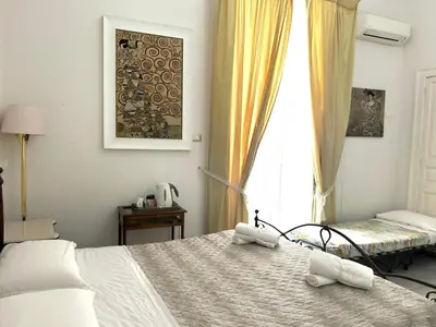 Letto o letti in una camera di Ciro a Maschio Angioino