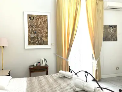 Letto o letti in una camera di Ciro a Maschio Angioino