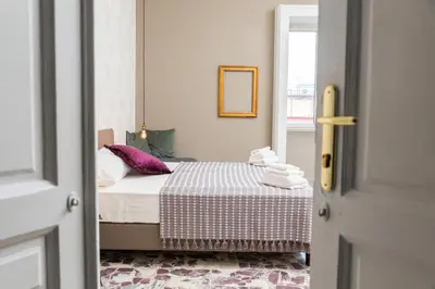 Letto o letti in una camera di N'Art Suites - Napoli