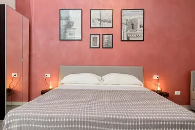 Letto o letti in una camera di N'Art Suites - Napoli