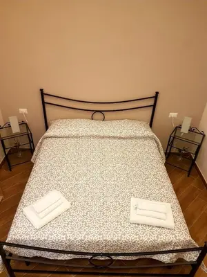 Letto o letti in una camera di Alexis Home