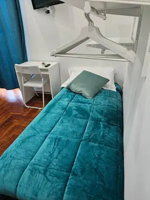 Letto o letti in una camera di B&B TERRONIA