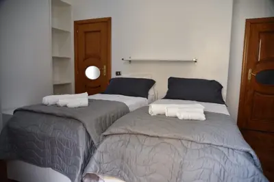 Letto o letti in una camera di B&B TERRONIA