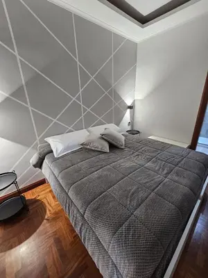 Letto o letti in una camera di B&B TERRONIA