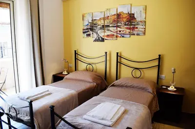 Letto o letti in una camera di Neapolis Pie