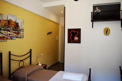 Letto o letti in una camera di Neapolis Pie